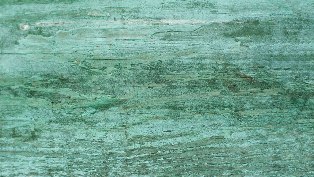 Grunge wall with cracks and peeling paint. Textured background.