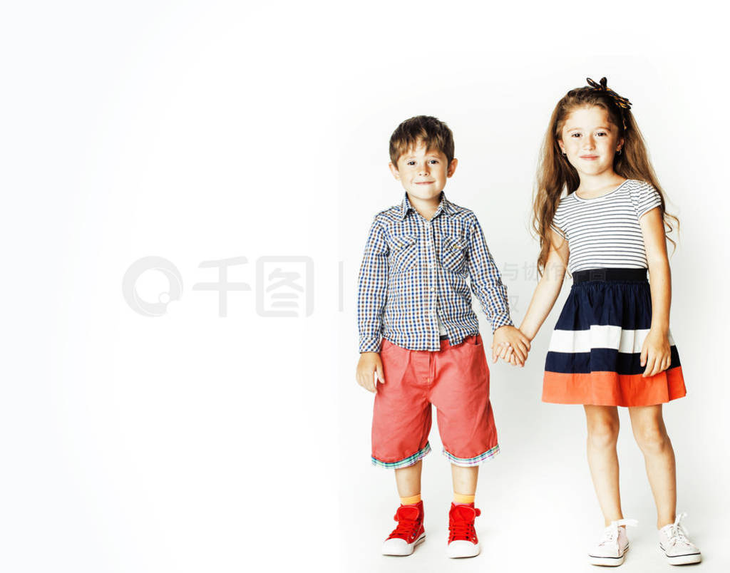 little cute boy and girl hugging playing on white background, ha