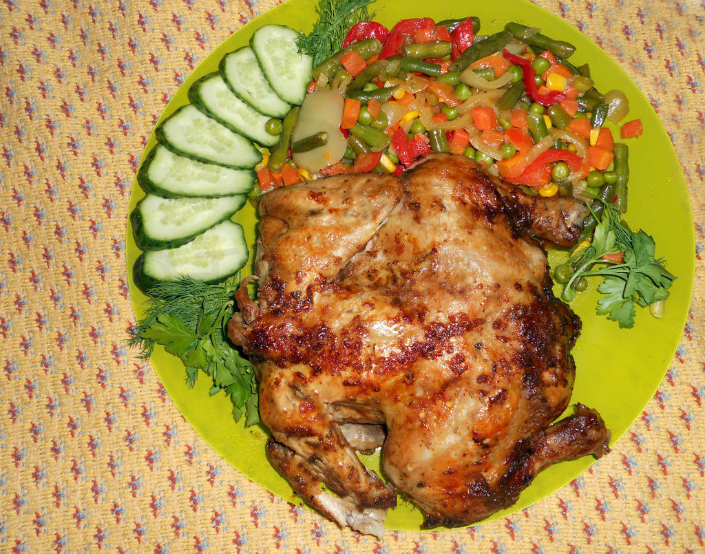 Chicken with vegetables. The guests gathered, all hungry. Christ