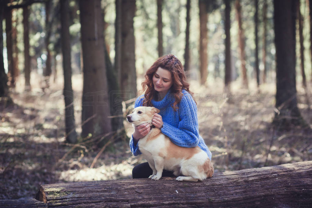 woman with her little dog park outdoors.