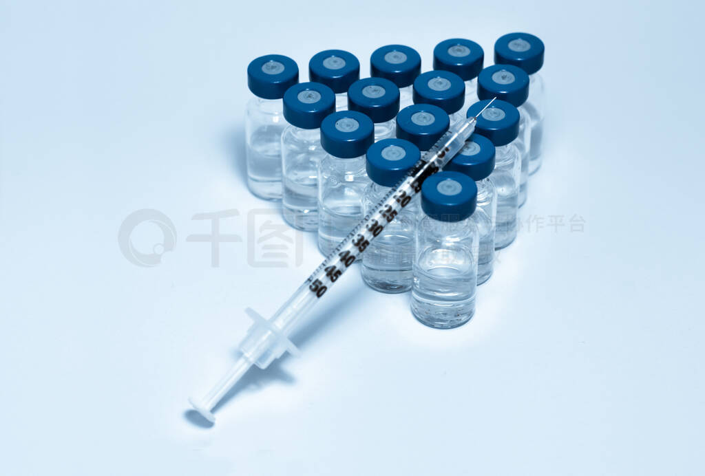 Glass medicine bottles with injection fluid with blue aluminium