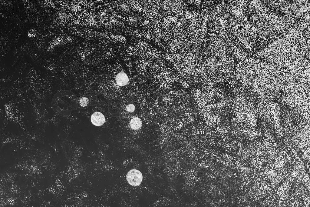 black and white texture of an ice surface with pure water ,cold