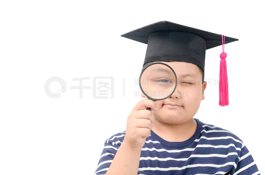 Fat student looking through a magnifying glass
