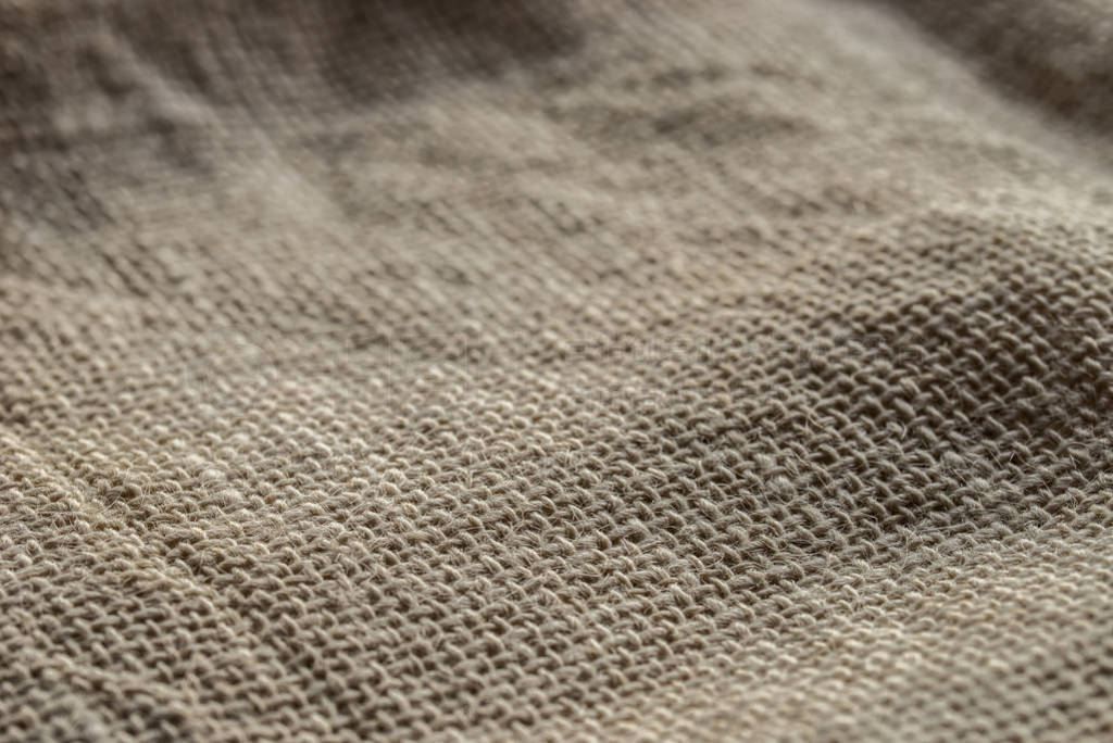 old dirty birlap textile texture background selective focus