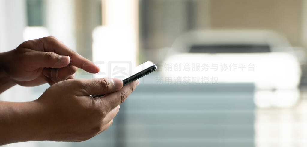 Man using smartphone using the phone for work everyday internet