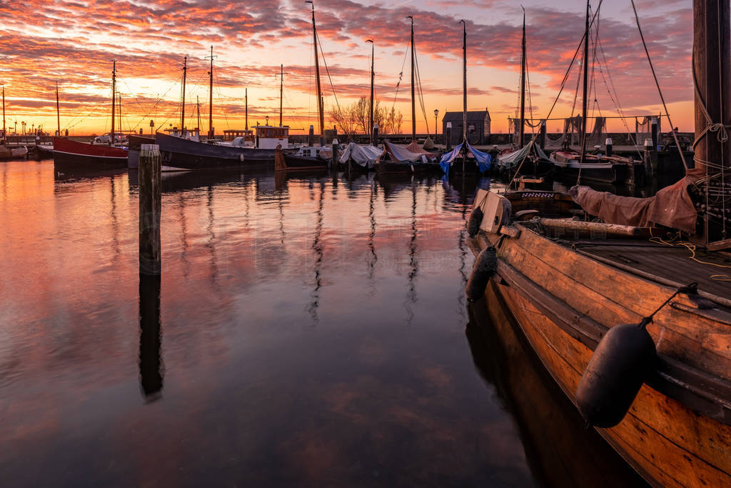 Urk Netherlands Europe, sunrise at the harbor of the small fishi