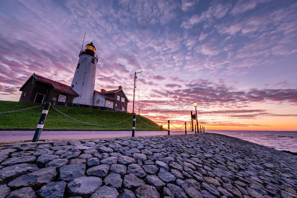 Urk Netherlands Europe, sunrise at the harbor of the small fishi