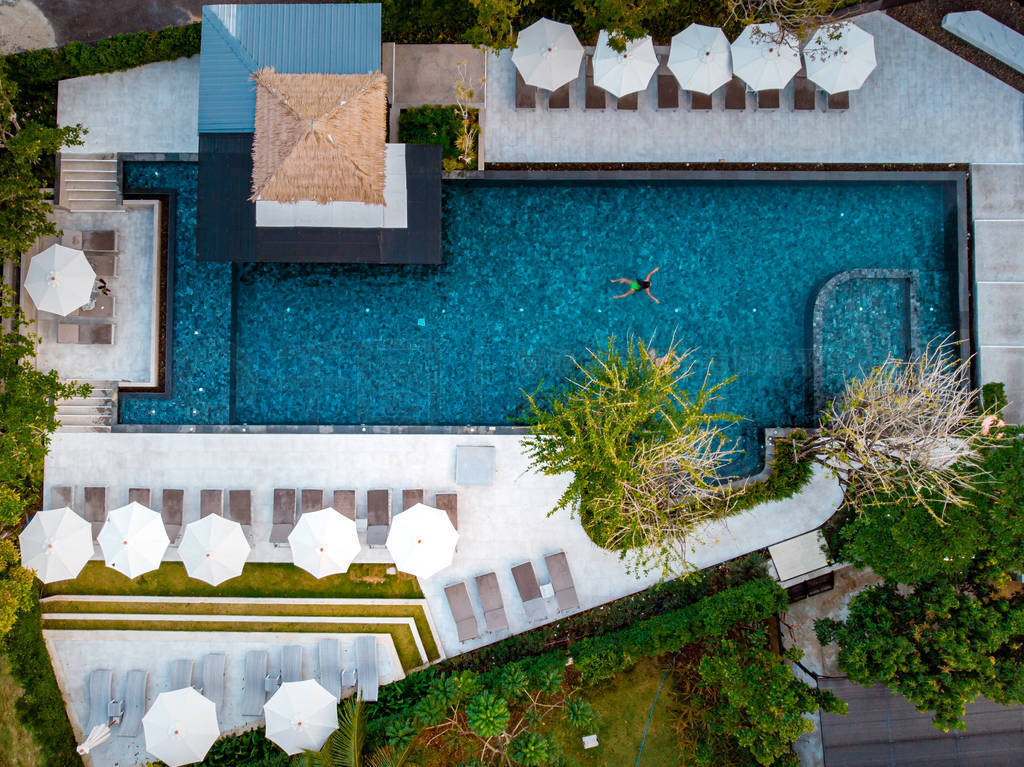 top view swimming pool, drone view pool, couple in swimming pool