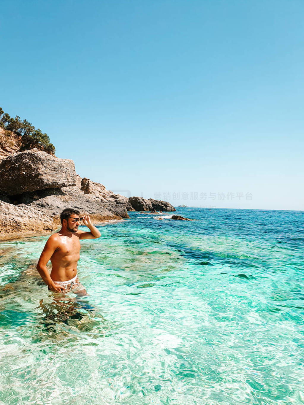 Sardinia Orosei coast Italy, guy on vacation at the Island of Sa