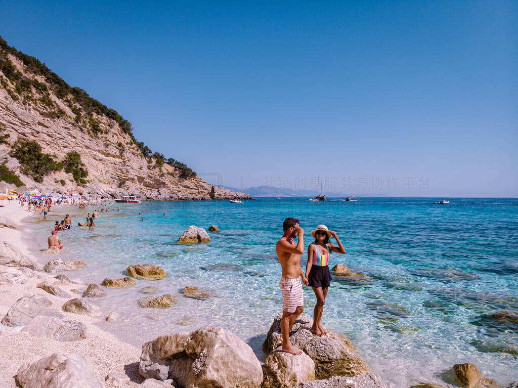 Sardinia Orosei coast Italy, men and woman, young couple adult o