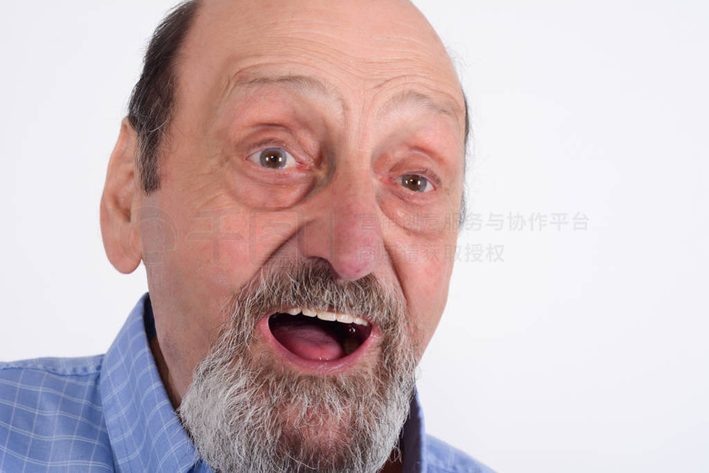 Portrait of happy senior man smiling