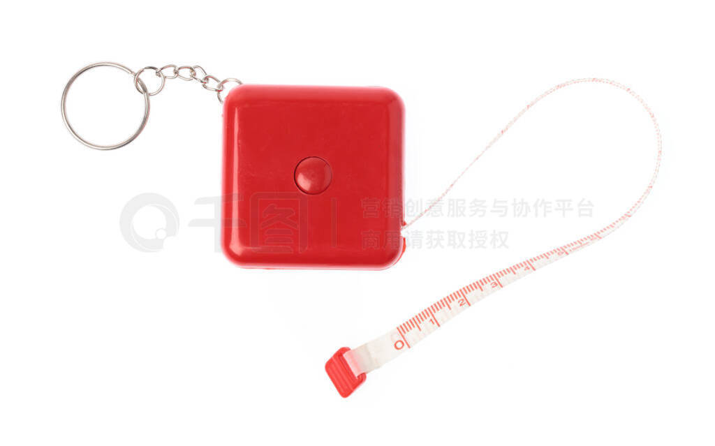 key chain by red measuring tape of the tailor isolated on white