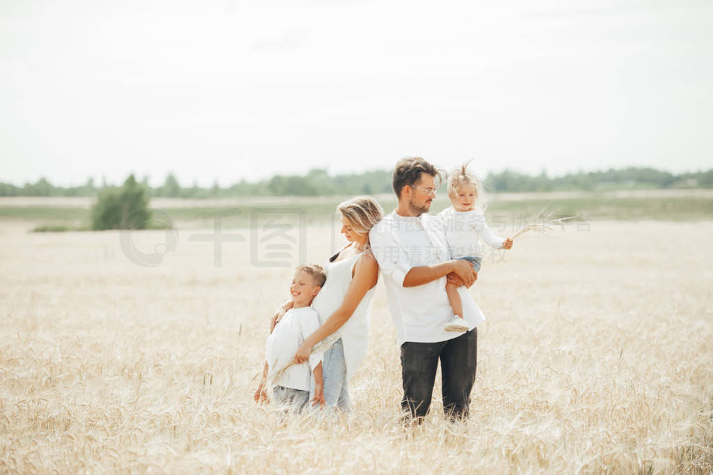 Portrait of a happy and fun family in the countryside.