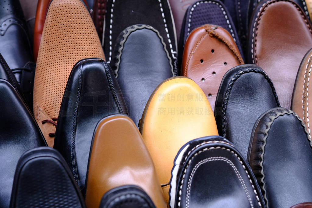 Close up of man shoe display for sale