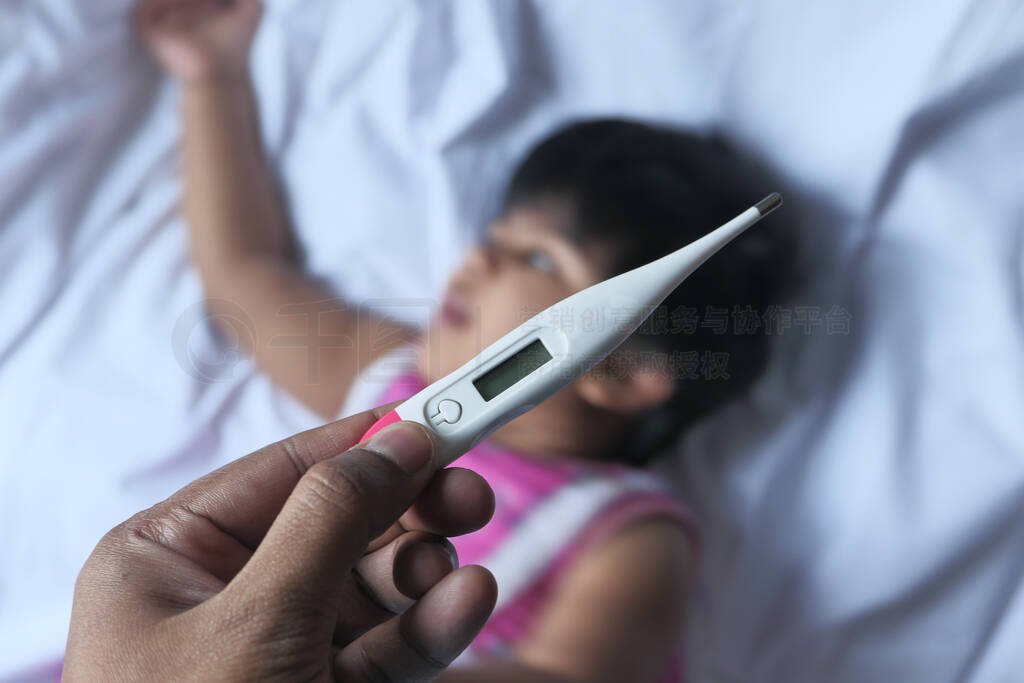 baby thermometer to measure the temperature of a sick baby, clos