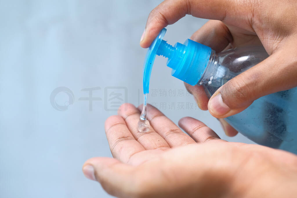 person hand using hand sanitizer for preventing virus
