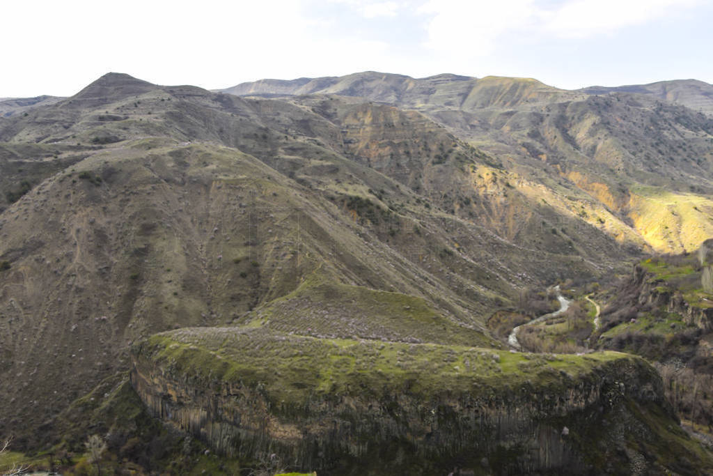 Mountain landscape view from a height of spring flowering light