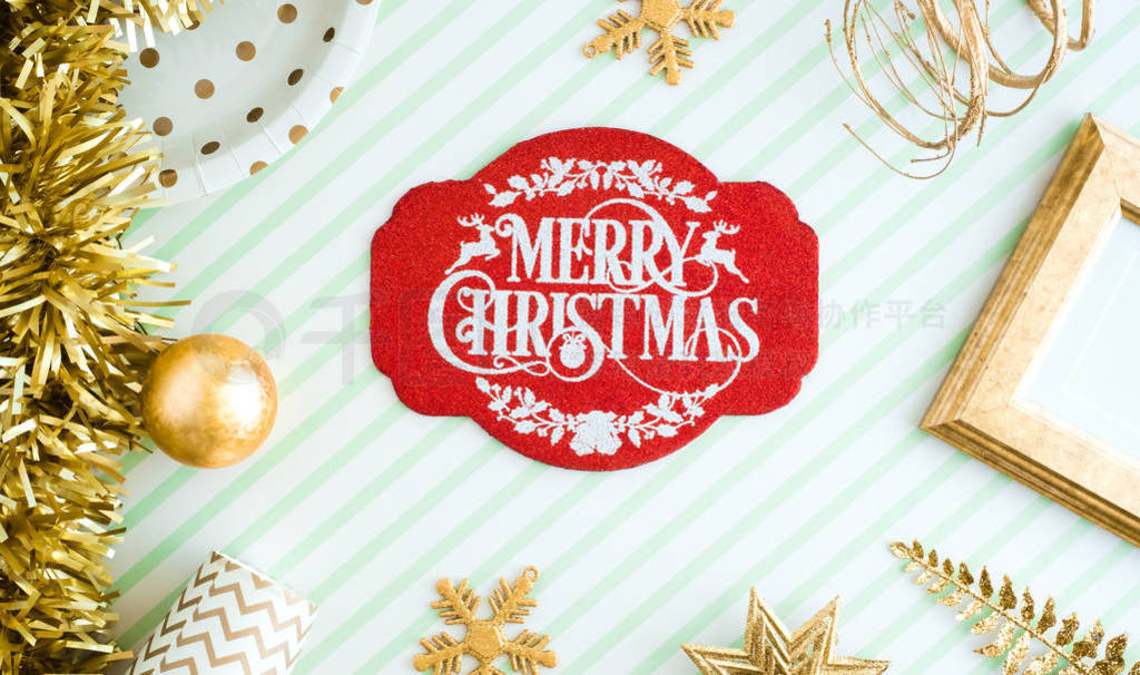 REd Merry christmas lable background.top view of sparkling gold