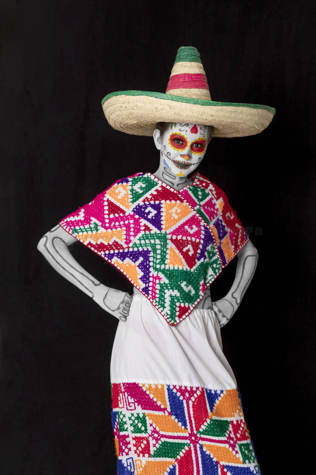 Catrina makeup. Young Mexican woman with typical costume.