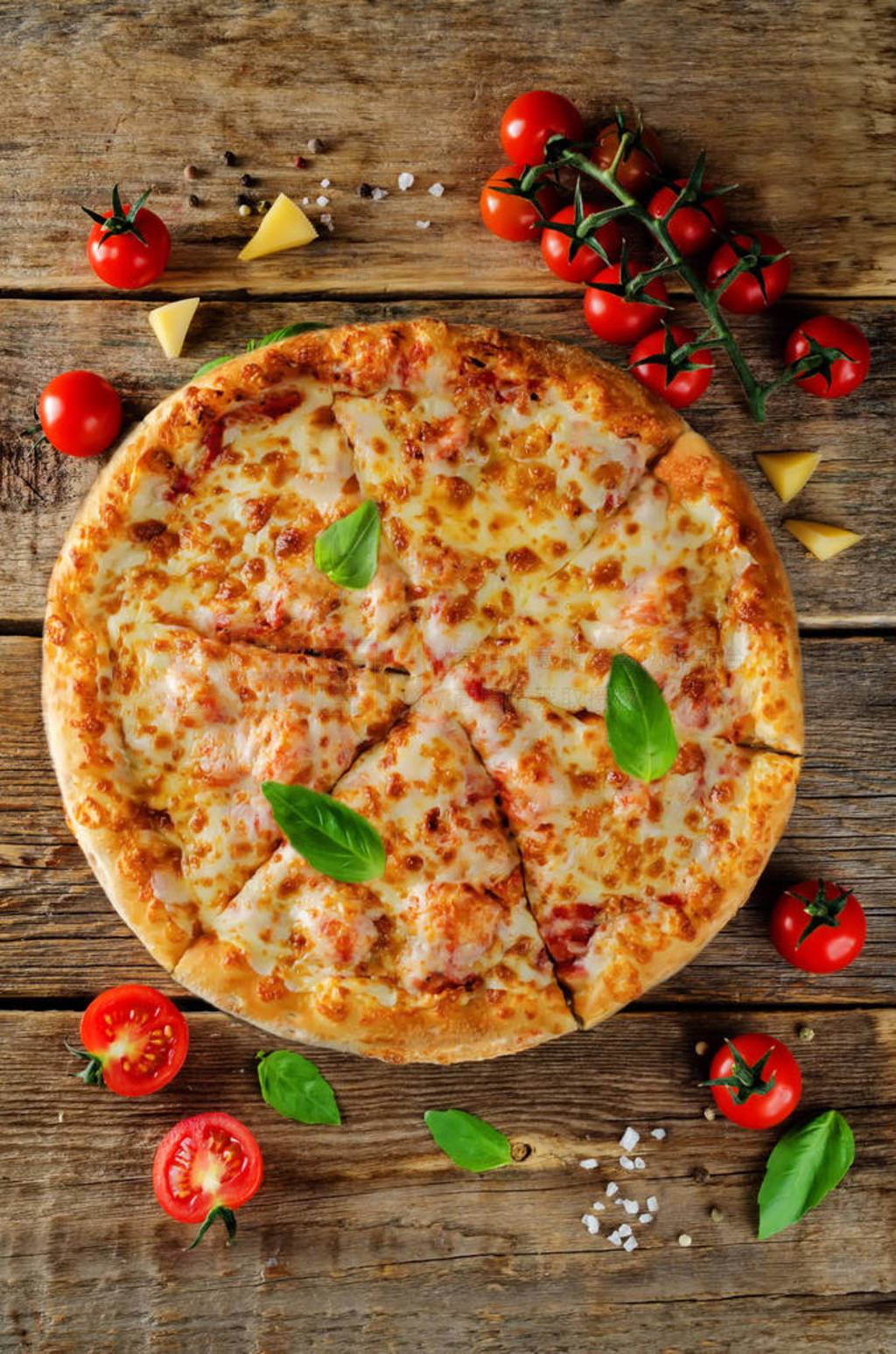 Pizza with cheese, tomato sauce and fresh tomatoes