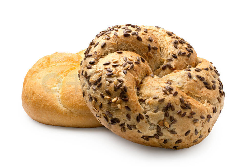 Whole wheat kaiser roll with seeds on top of plain kaiser roll