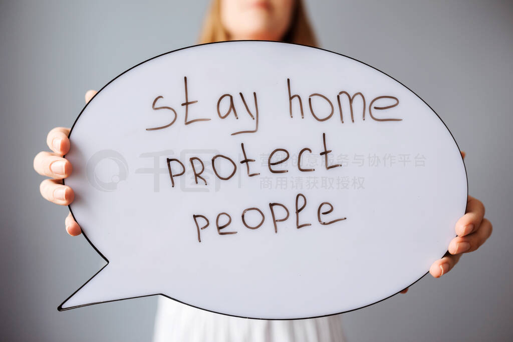 Close up view of the speech bubble with text stay home, protect