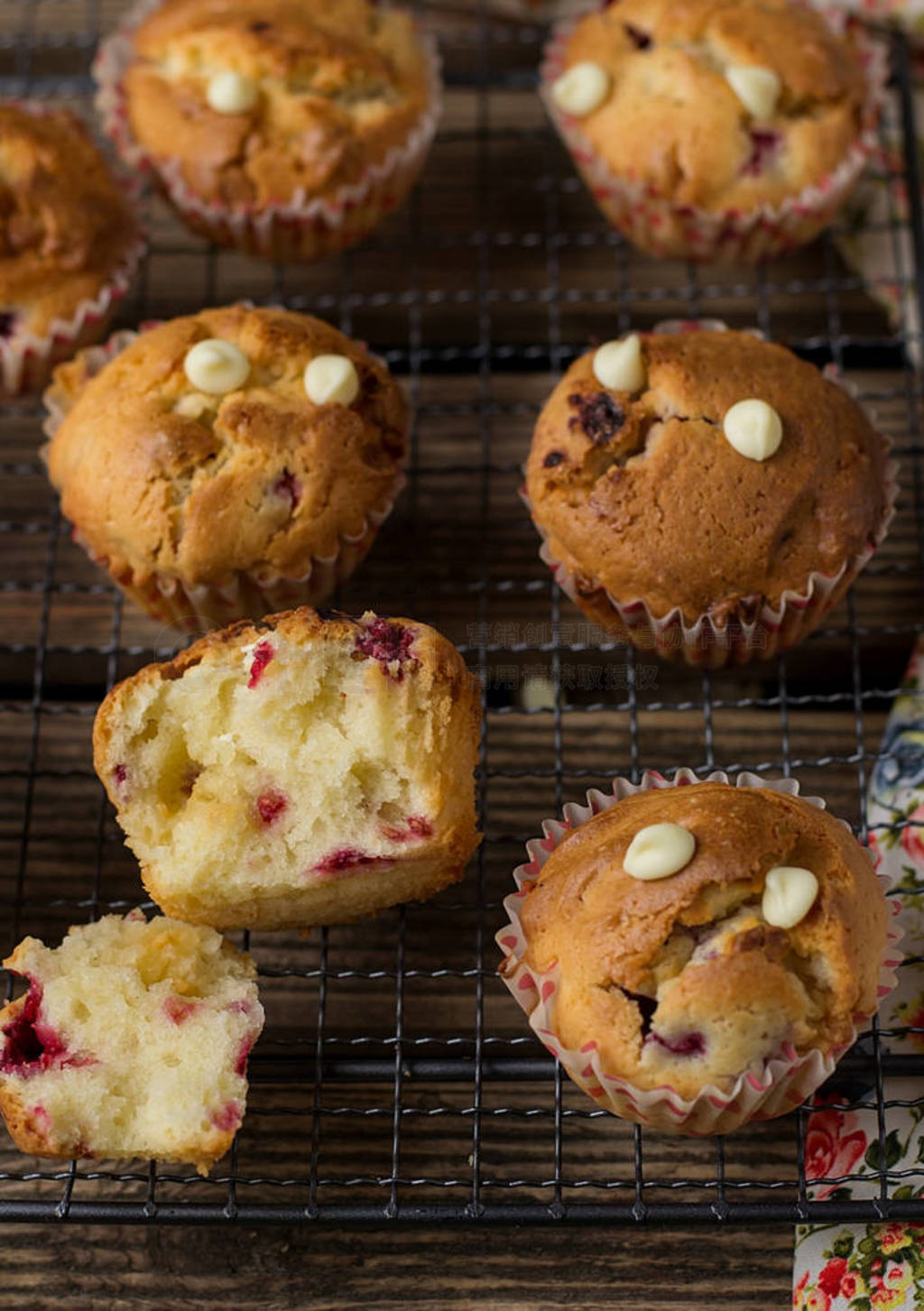 Sweet muffins with raspberries, cranberries and white chocolate