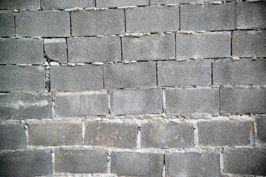 Grey wall texture background for Old grey brick wall rough surfa