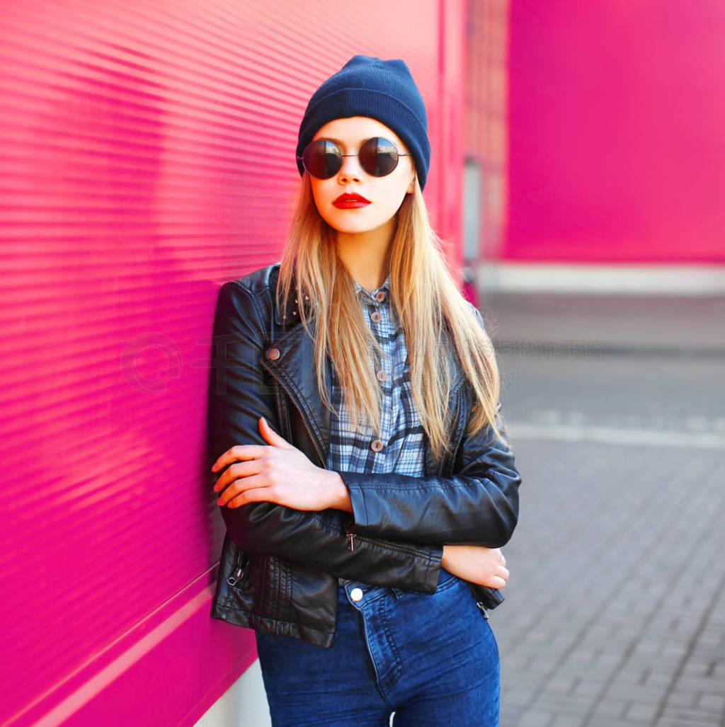 Stylish portrait young blonde woman in rock black style jacket,