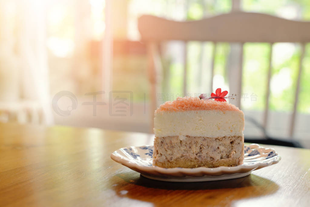 Piece of homemade taro cake in classic plate on table with copy
