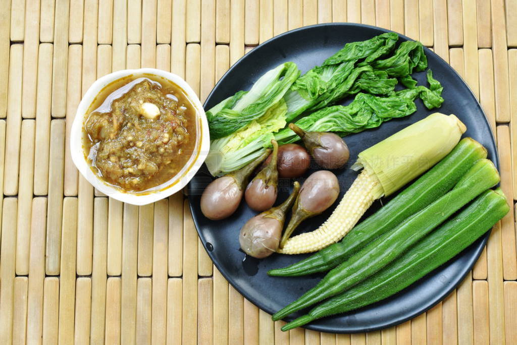 spicy shrimp paste sauce eat with mixed boiled vegetable on pla
