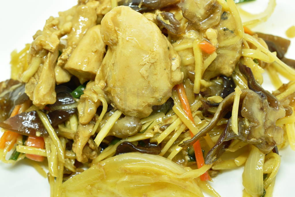 stir fried chicken with slice ginger and ear mushroom on plate