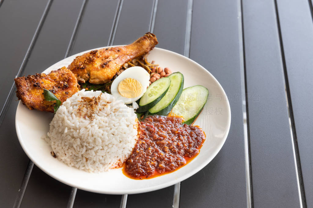 Nasi lemak with fried chicken and sambal, Malaysia popular food