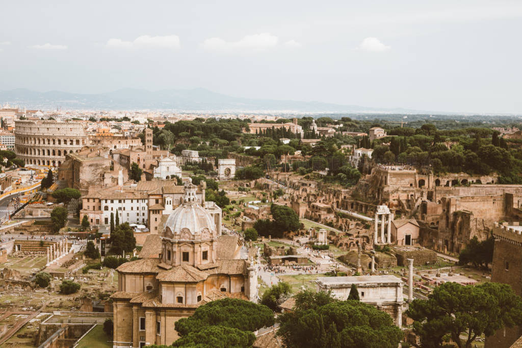 Panoramic view of city Rome with Roman forum and Colosseum from