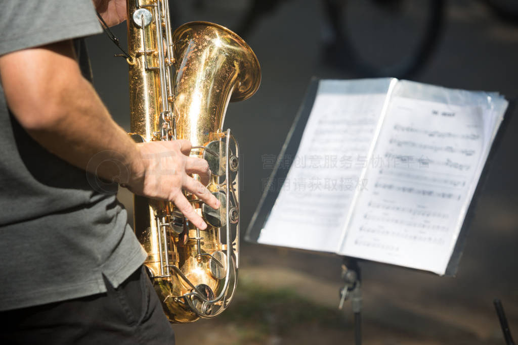 Street musician playing saxophone