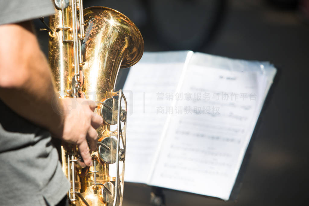 Street musician playing saxophone