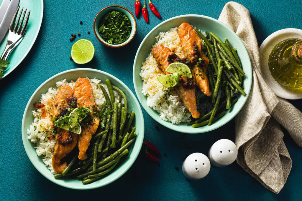 fresh salmon fried with ginger and garlic in coconut milk, with