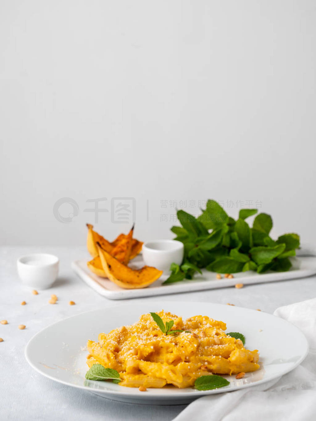 Pumpkin pasta penne with thick creamy sauce of baked squash and
