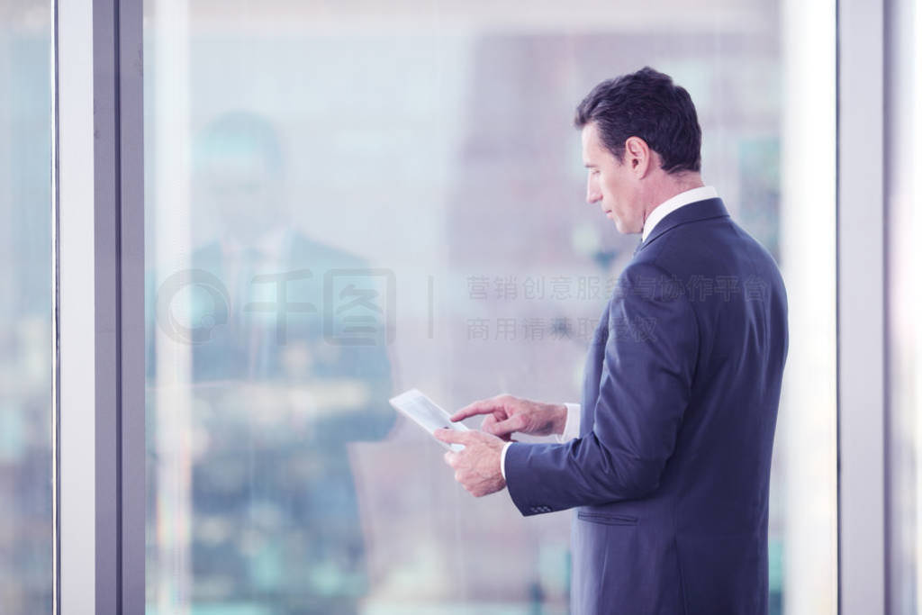 Businessman working with tablet