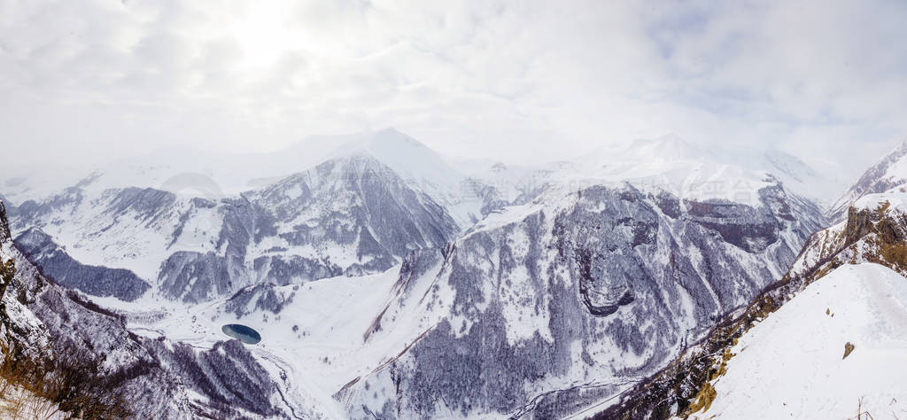 Georgia, Cross pass. panorama of mountains on a winter day. Sun,