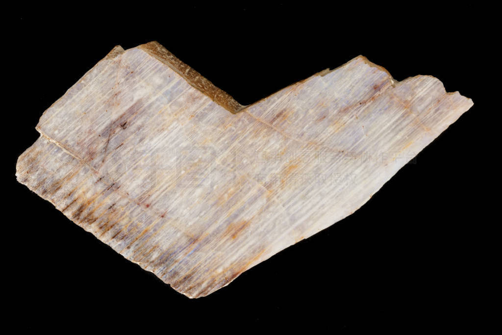 Macro of a stone mineral Moonstone on a black background