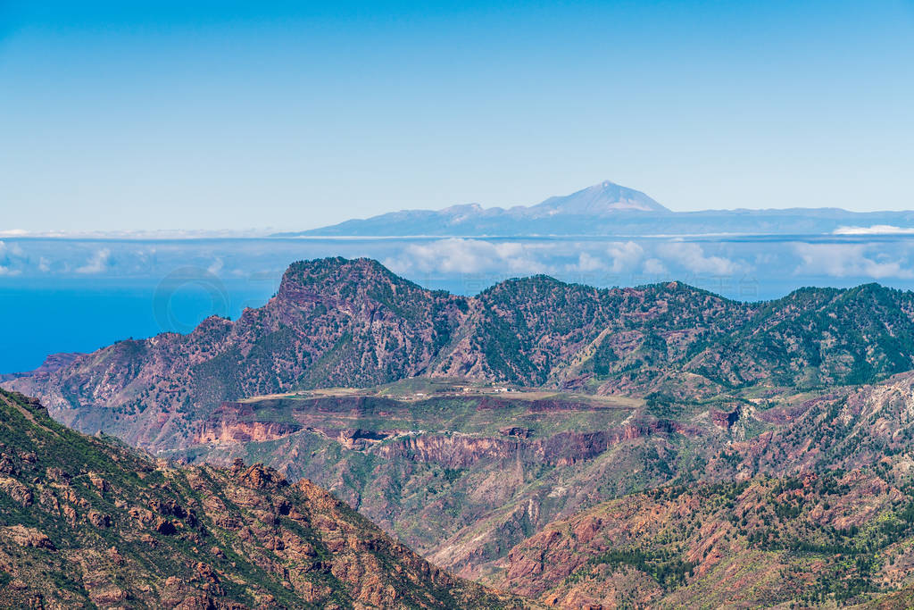 Roque Bentayga with Pico del Teide in the background. View from