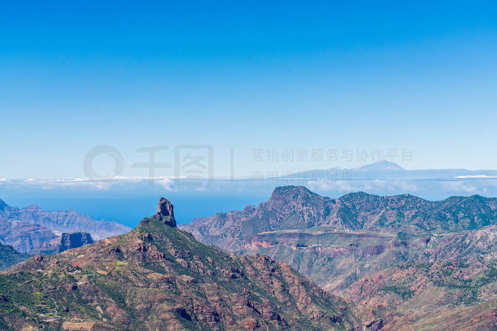 Roque Bentayga with Pico del Teide in the background. View from