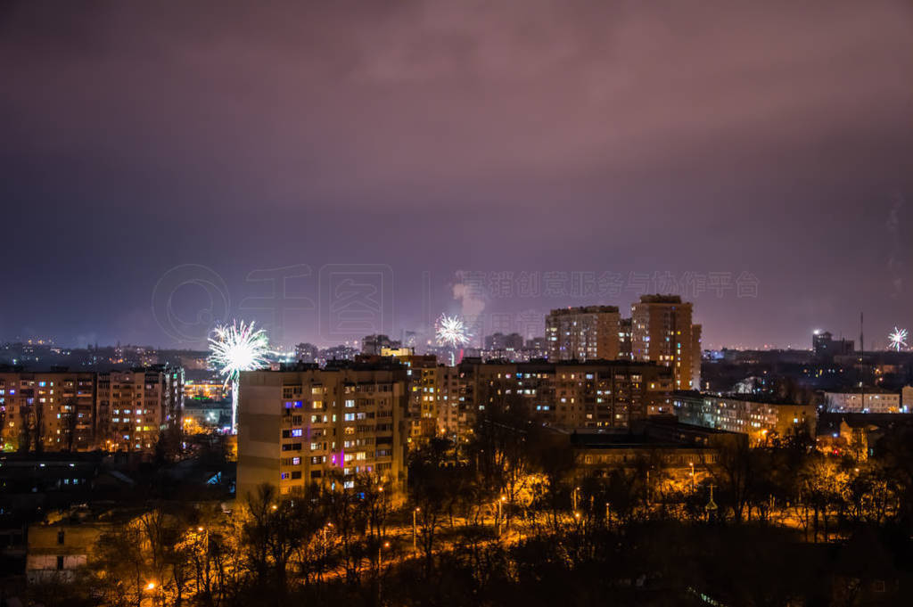 Firework on New Year's Eve over the city.
