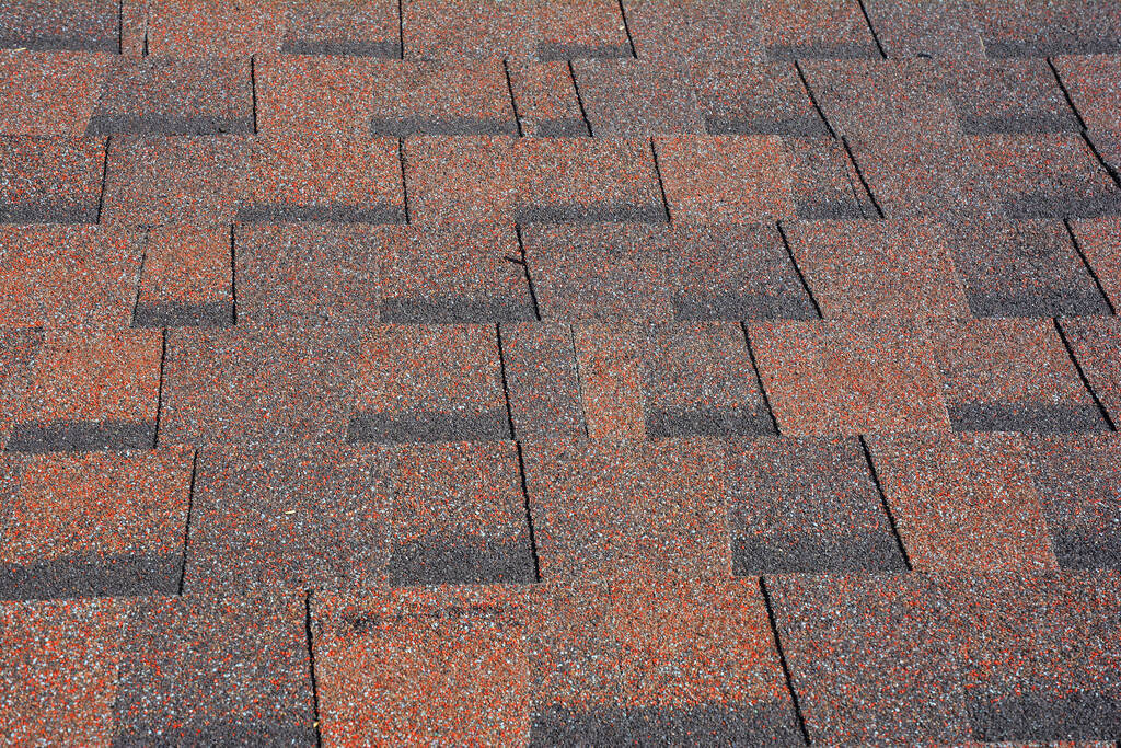 Asphalt Shingles Textured Background Photo. Red Roof Shingles -