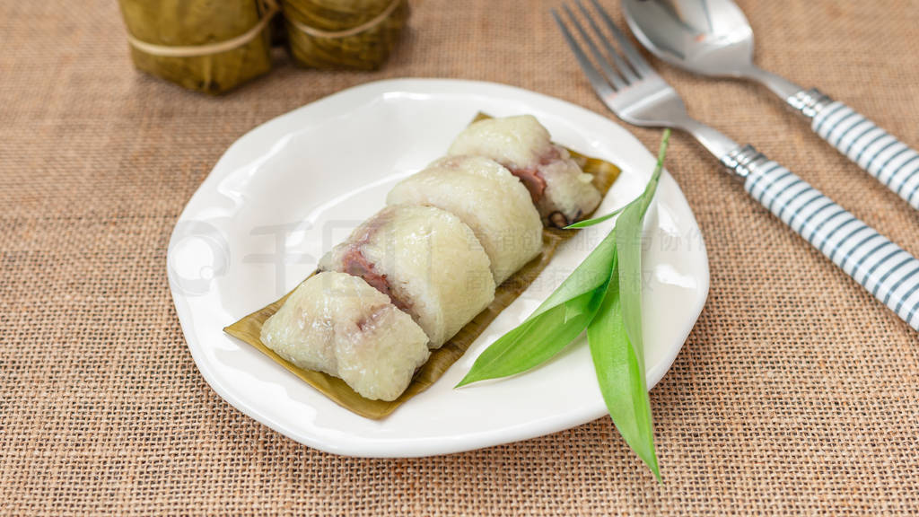 Thai dessert sticky rice or Khao Tom Mad, Wrapped the banana in