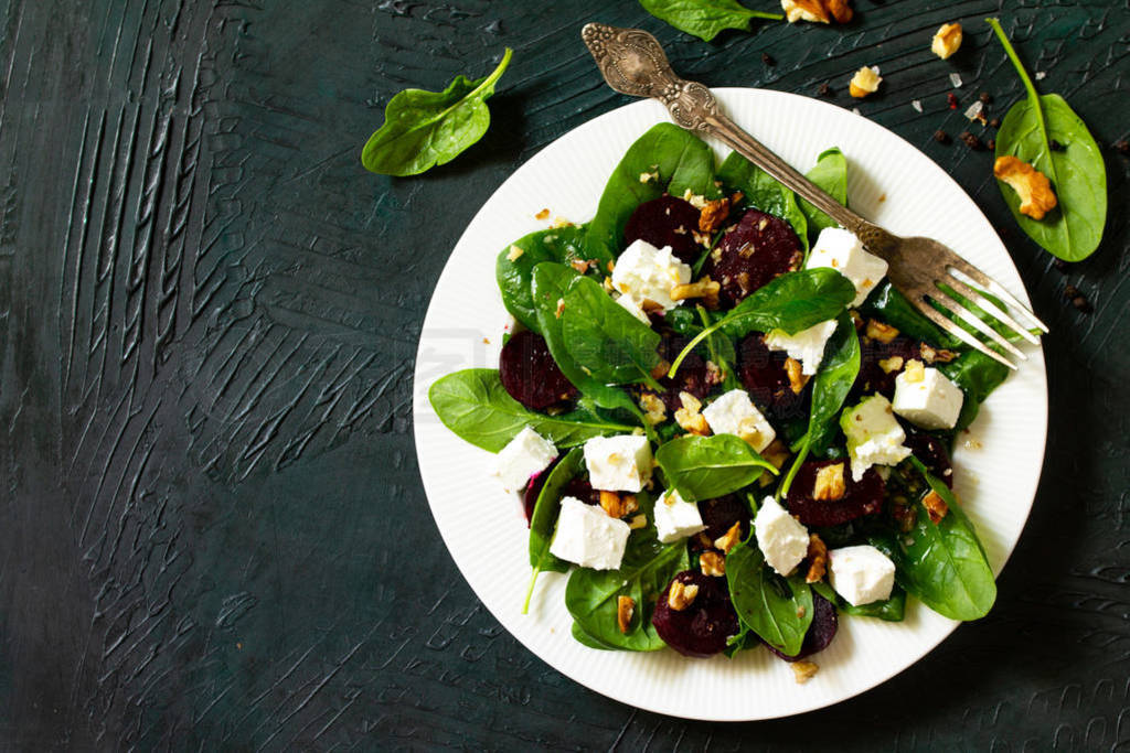 Salad with spinach, feta cheese, beetroot and walnut, vegetable