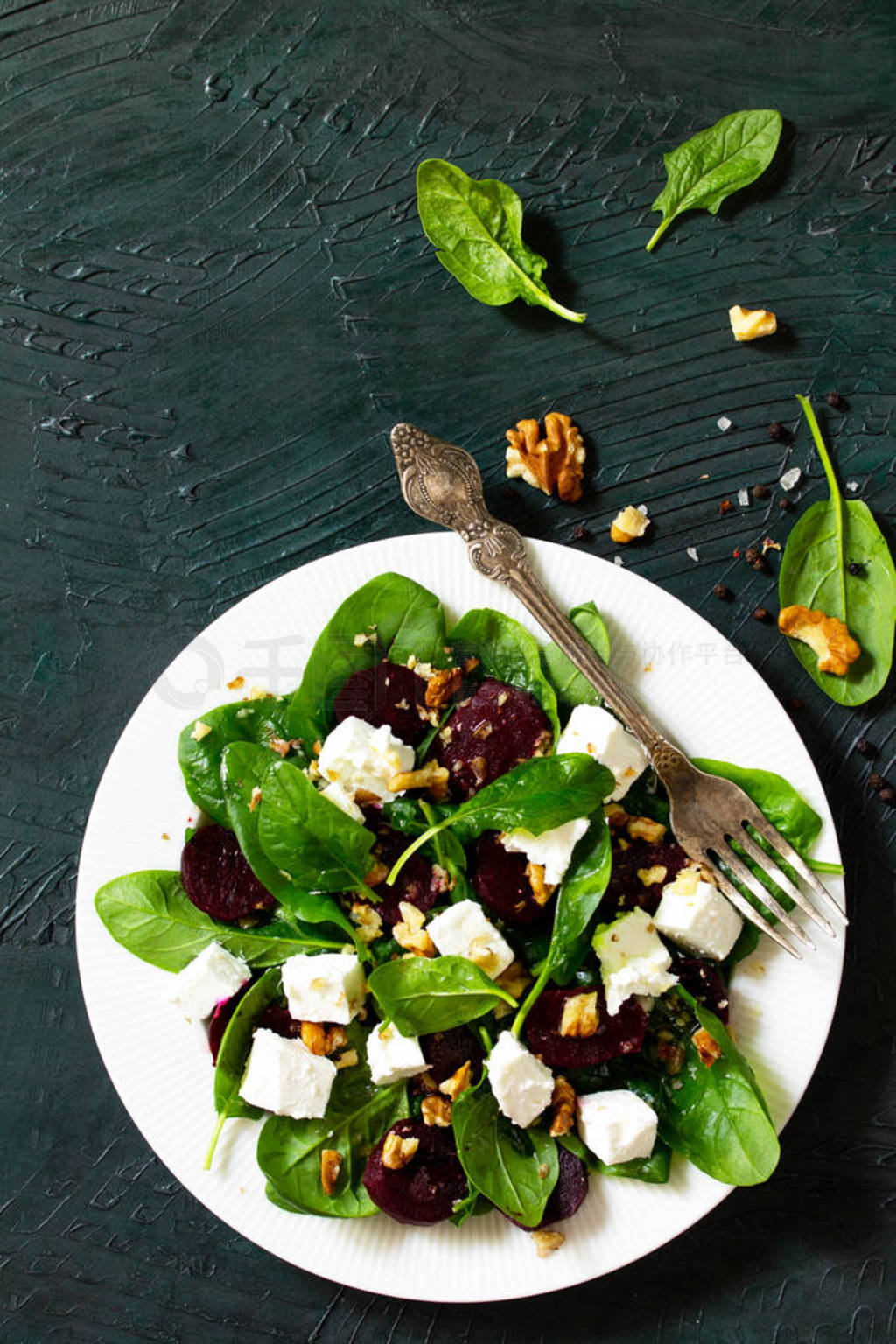 Salad with spinach, feta cheese, beetroot and walnut, vegetable