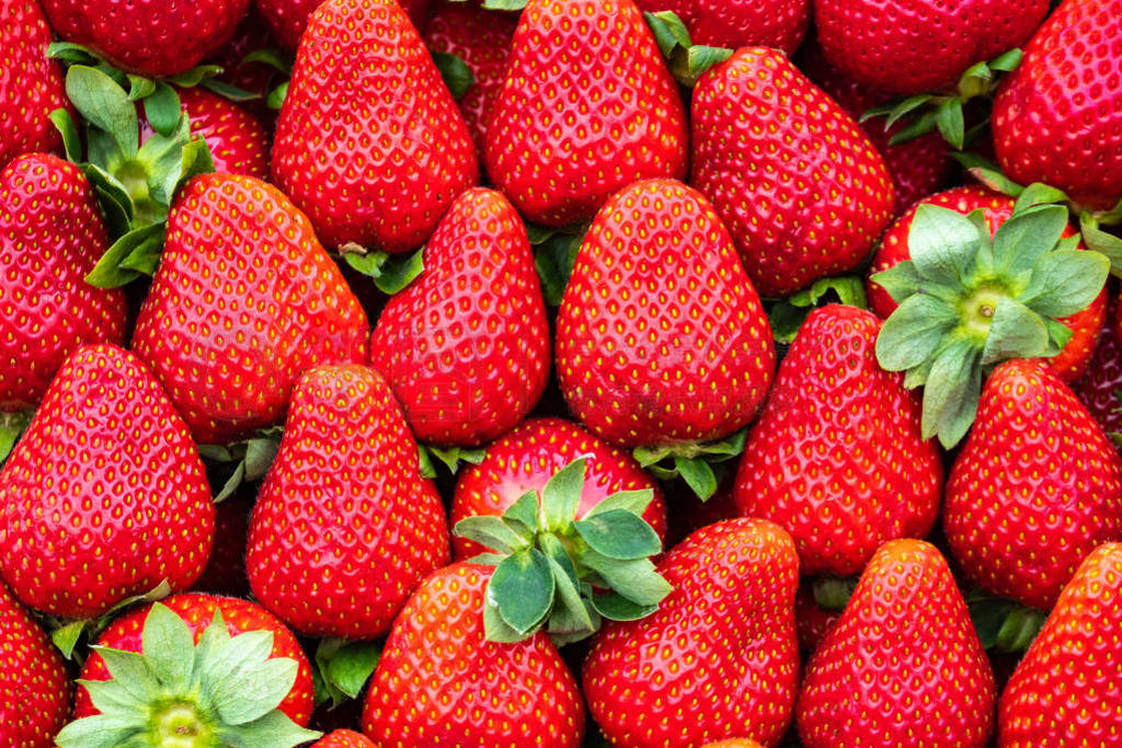 red strawberries pattern in market, fresh strawberries texture,