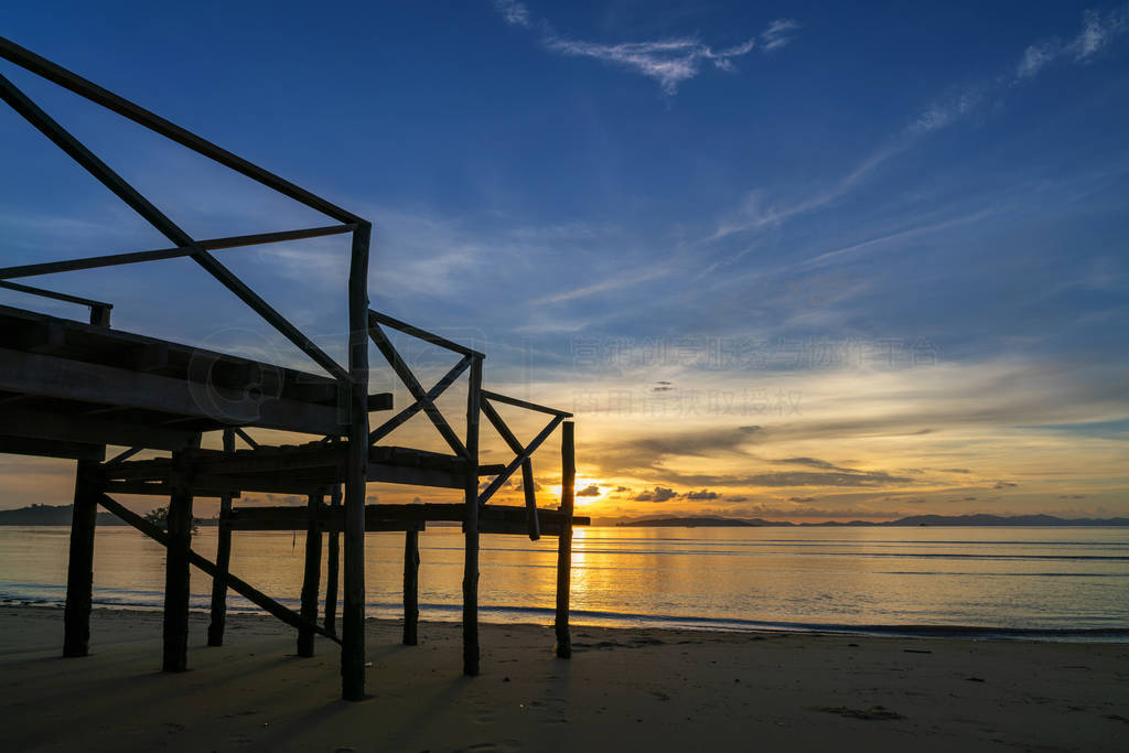 Wooden porch by the sea in sunrise or sunset time